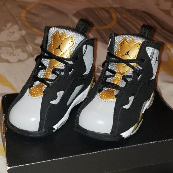 black and gold baby jordans